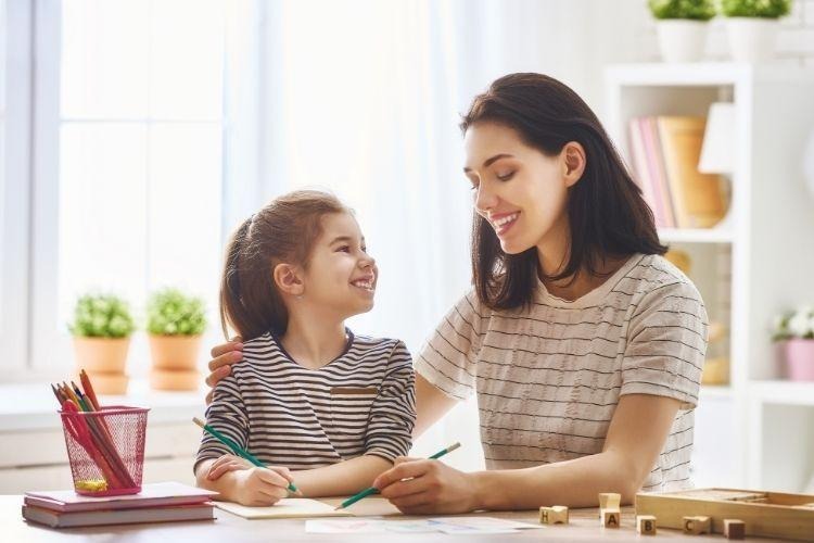 Woman teaching child about economic concepts